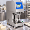 Commercial Dough Sheeter in a commercial processing environment Commercial Dough Sheeter in a commercial processing environment