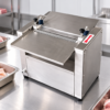 Pork Skinning Machine in a commercial processing environment Pork Skinning Machine in a commercial processing environment