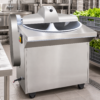 Vegetable Cutting Machine in a commercial processing environment Vegetable Cutting Machine in a commercial processing environment